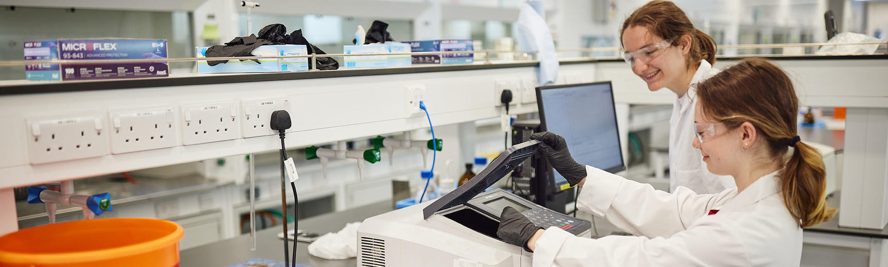 Students using lab equipment