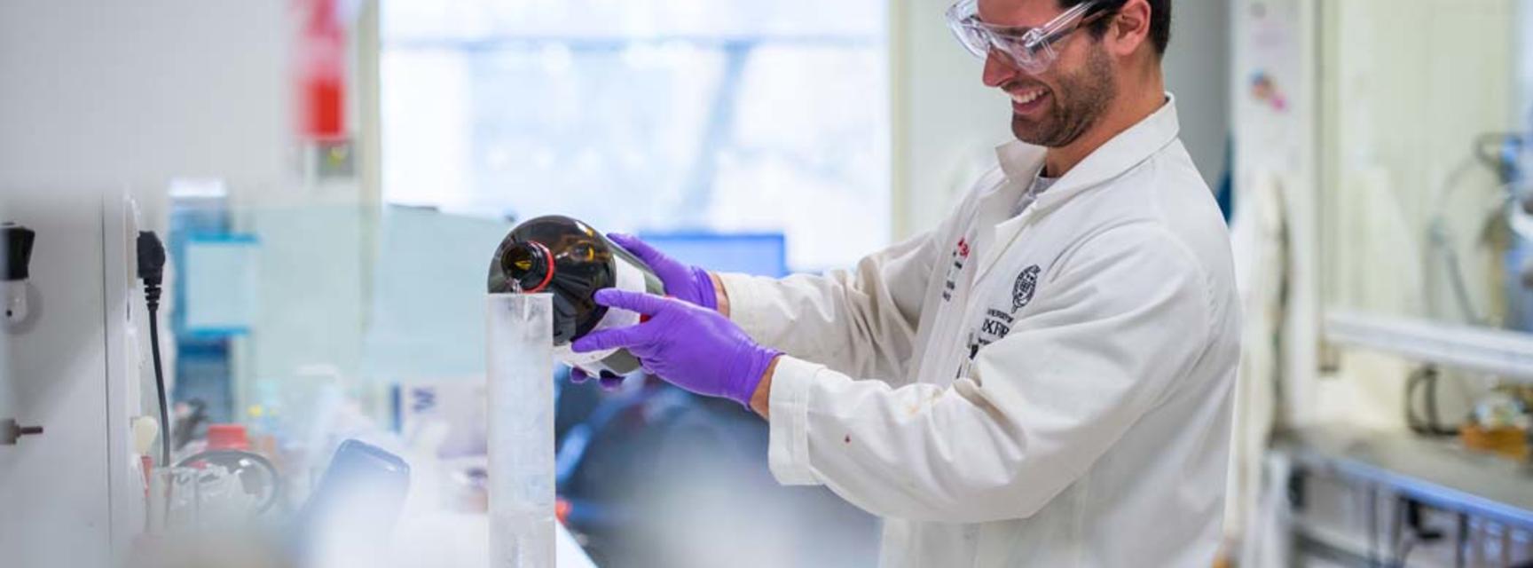 Photo of person in a laboratory carrying out research