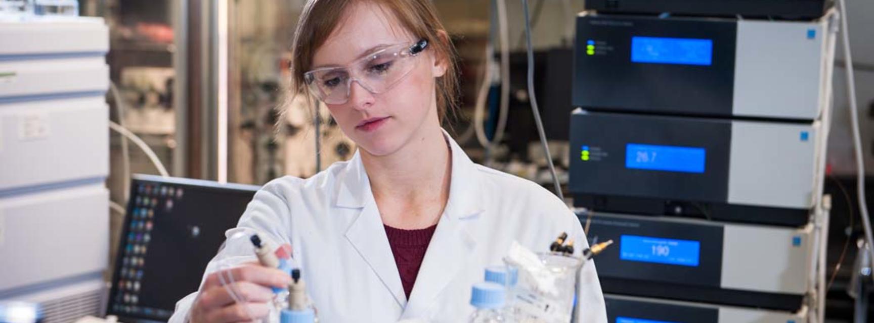 Photo of person in a laboratory undertaking research