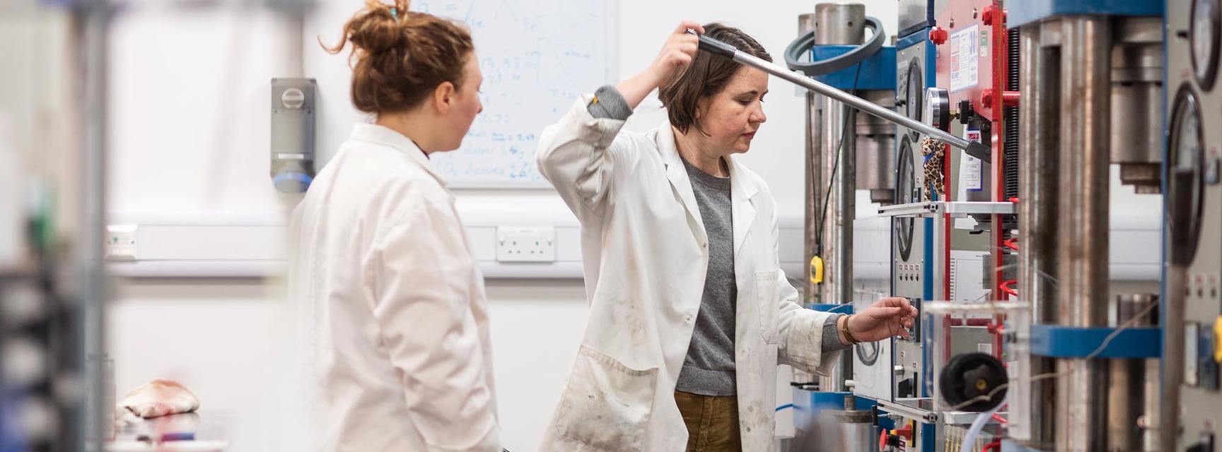 Photo of person in a laboratory undertaking research