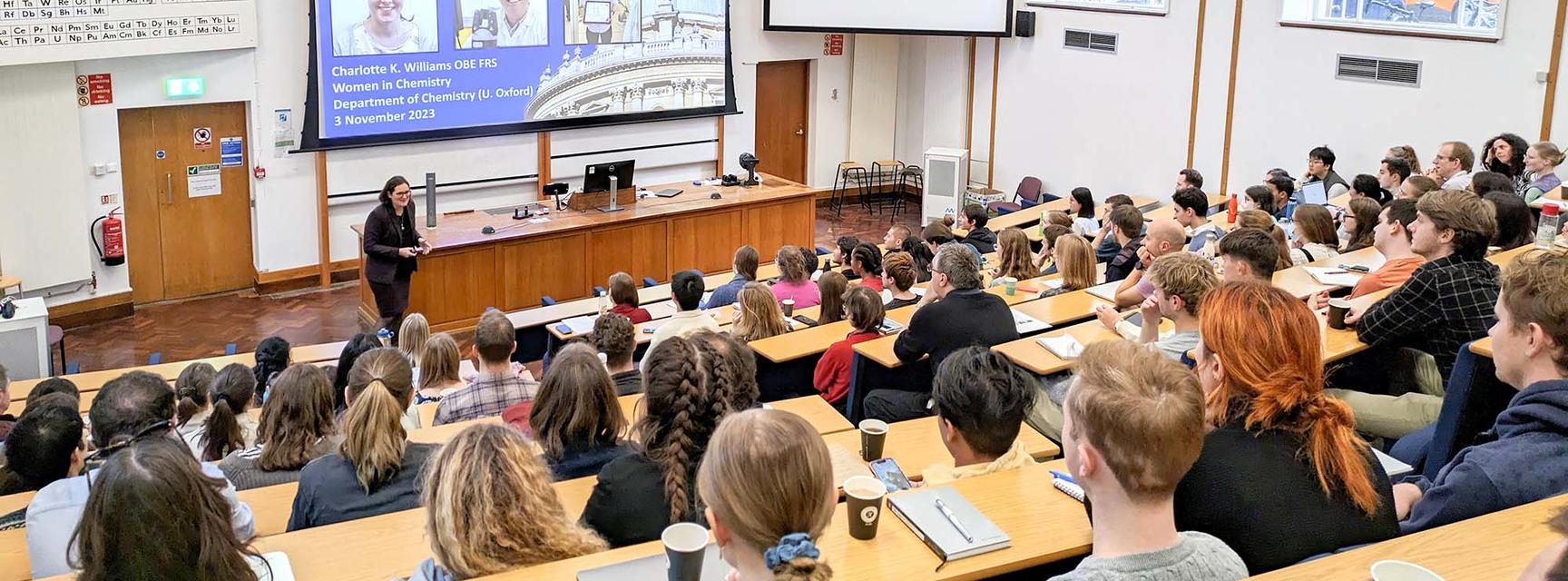 Picture of a full lecture theatre at an Oxford Women in Chemistry symposium.