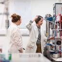 Photo of person in a laboratory undertaking research