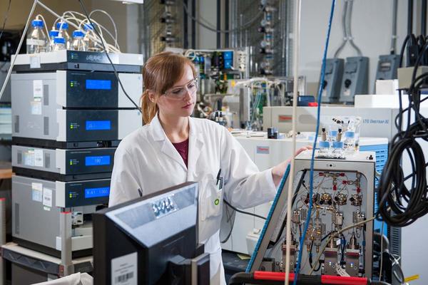 Photo of person in a laboratory undertaking research