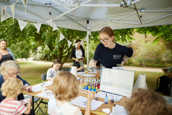 Picture showing a Chemistry Ambassador working with members of the public