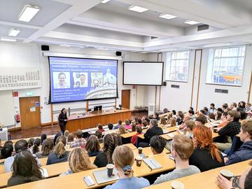 Picture of a full lecture theatre at an Oxford Women in Chemistry symposium.
