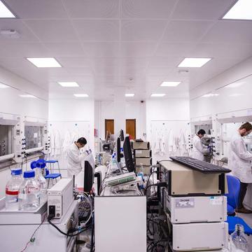 Photo of person in a laboratory undertaking research