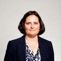 Head and shoulders photo of Charlotte Williams standing in front of a white background.